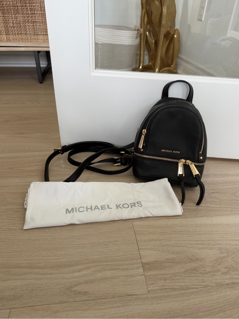 Michael Kors Rhea Black Leather Mini Backpack with Gold Hardware